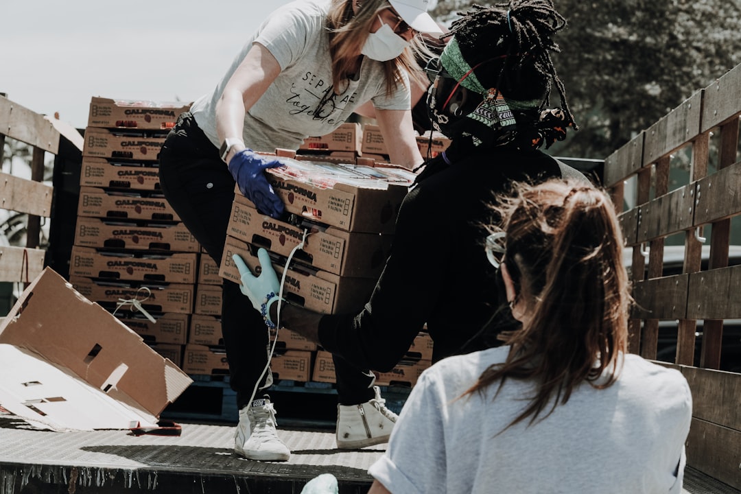 Volunteers handling boxes during a traditional fundraising distribution