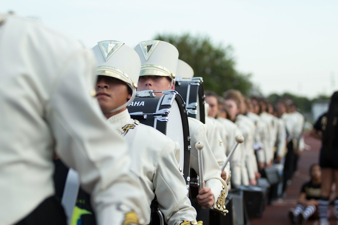 Marching band performing with musical instruments